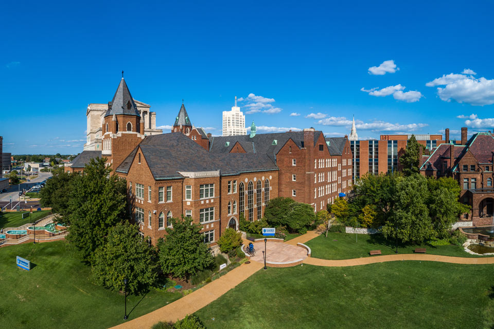 An aerial photo of Cook Hall at Saint Louis University during the day. 