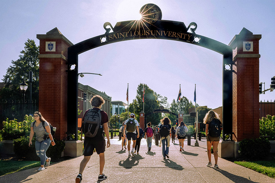 Students walk to class on the first day of classes of the new semester at SLU 