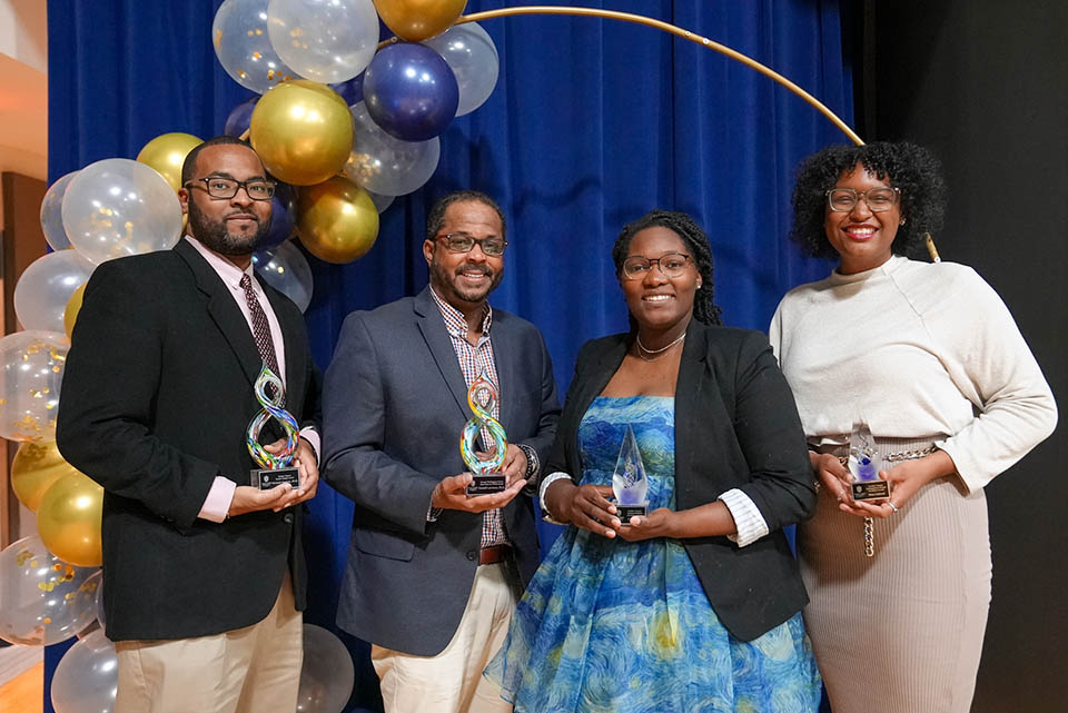 From left are Michael Hankins, Ph.D., Donald Lawrence, Ph.D., Zenae Cherry and Rhea Caldwell. Photo by Cristina Fletes.