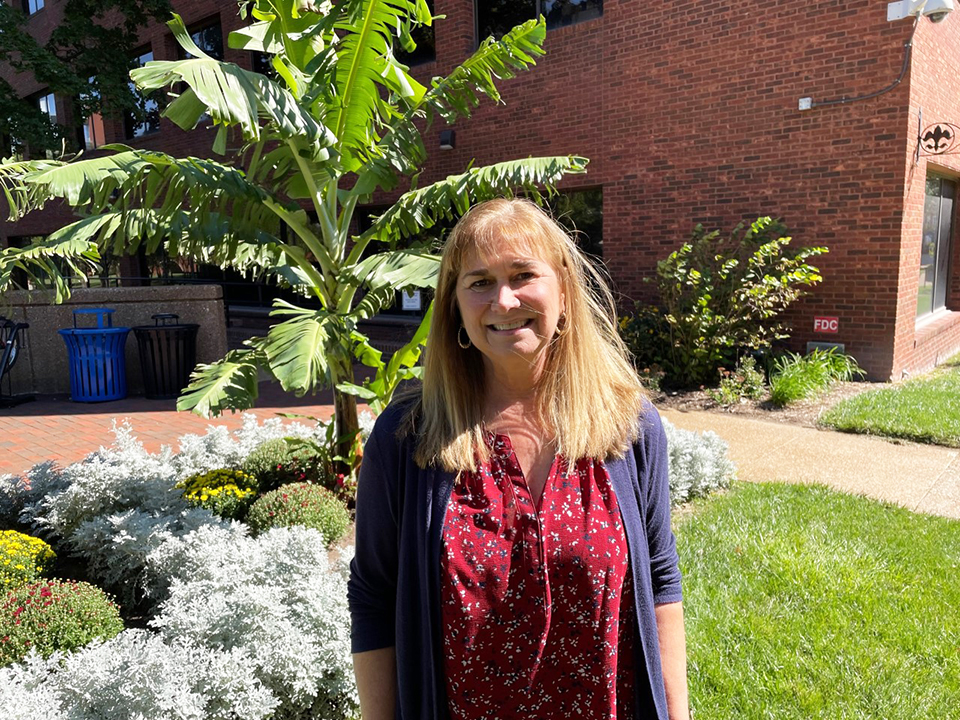 Bobbi Shatto, Ph.D., associate professor of nursing and coordinator for the MSN-CNL program. Dr. Shatto poses for a photo outdoors on a sunny day. 