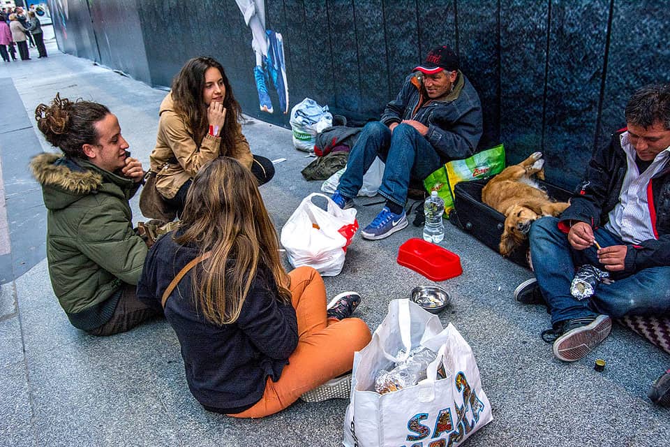 SLU students share a meal with some Madrid residents