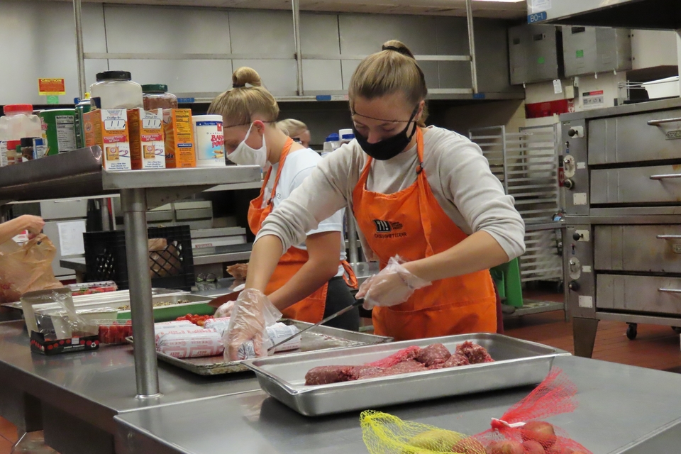 Girls working in Campus Kitchen