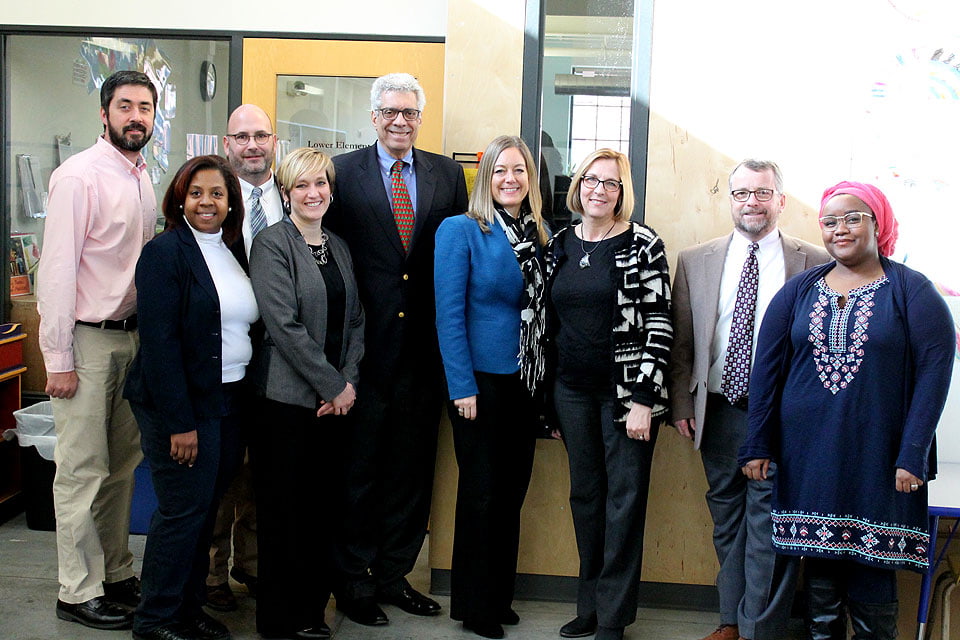 University leaders and City Garden Montessori staff members