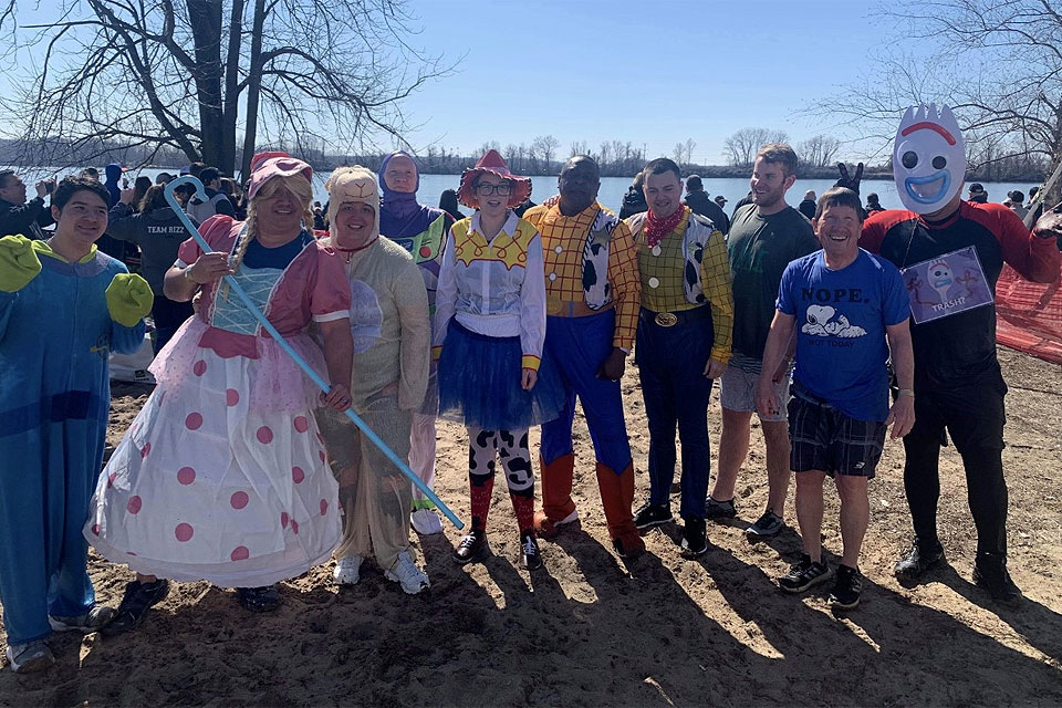 The heroes of Toy Story, as portrayed by members of SLU's Department of Public Safety (DPS), share a laugh after their Polar Plunge to raise funds from the Special Olympics Missouri on Saturday, Feb. 29. Submitted photo