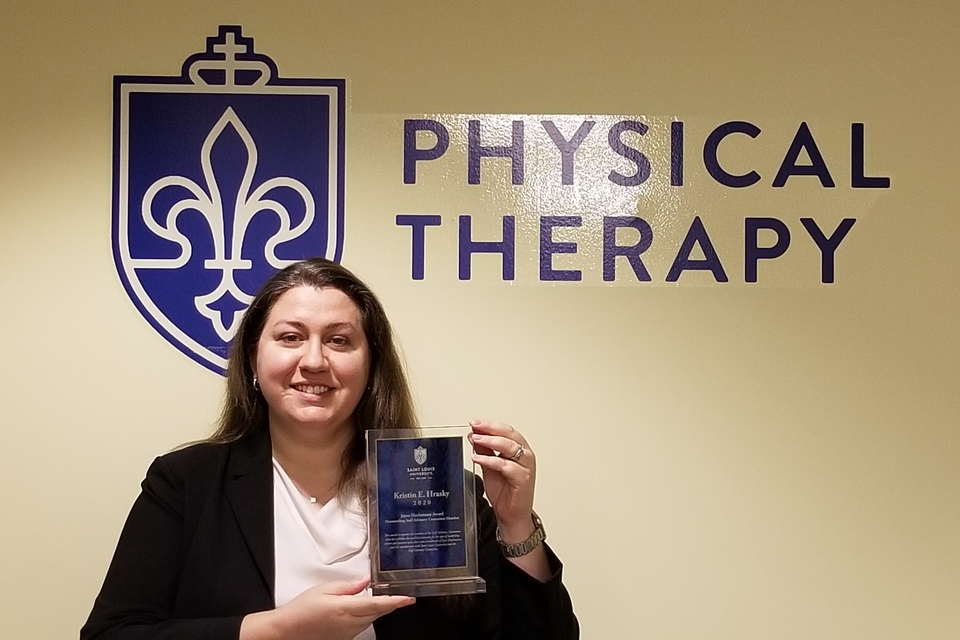 Kristin Hrasky with her Joyce Huelsmann Outstanding SAC Member Award.