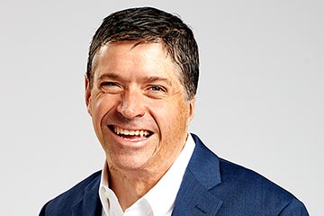 Headshot of 2023 Commencement Speaker John O’Leary 