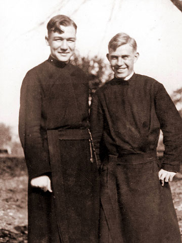 John Francis Bannon, S.J. (left) poses with a fellow Jesuit.