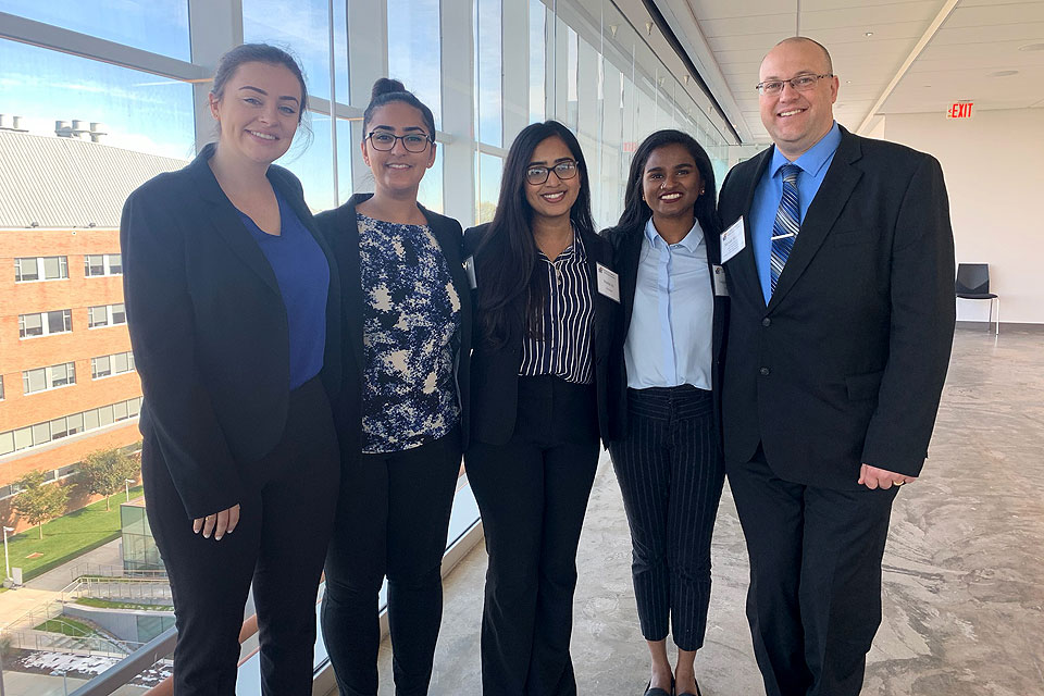 SLU's MHA Case Competition team.