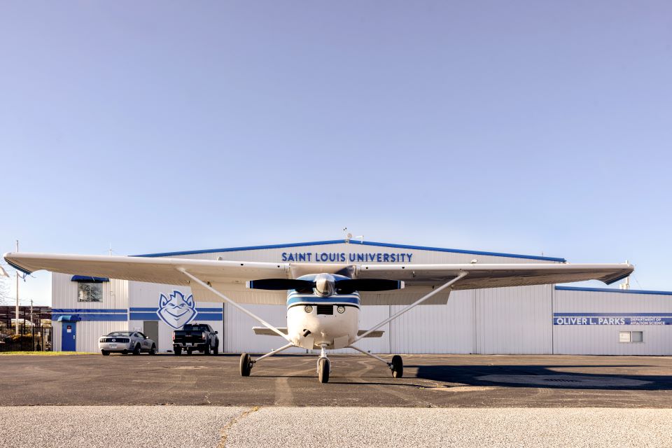 Plane in front of Hangar