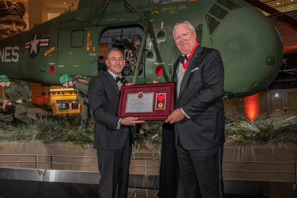 Trustee Paul Kalsbeek receives award from Maj. Gen. James W. Lukeman USMC (Ret.). Photo submitted. 