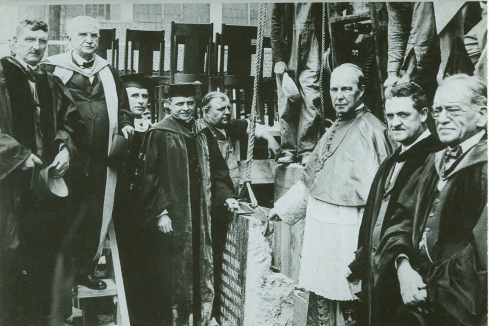 Alphonse Schwitalla, S.J. (center) joins other faculty and University leaders at the dedication of the School of Medicine.
