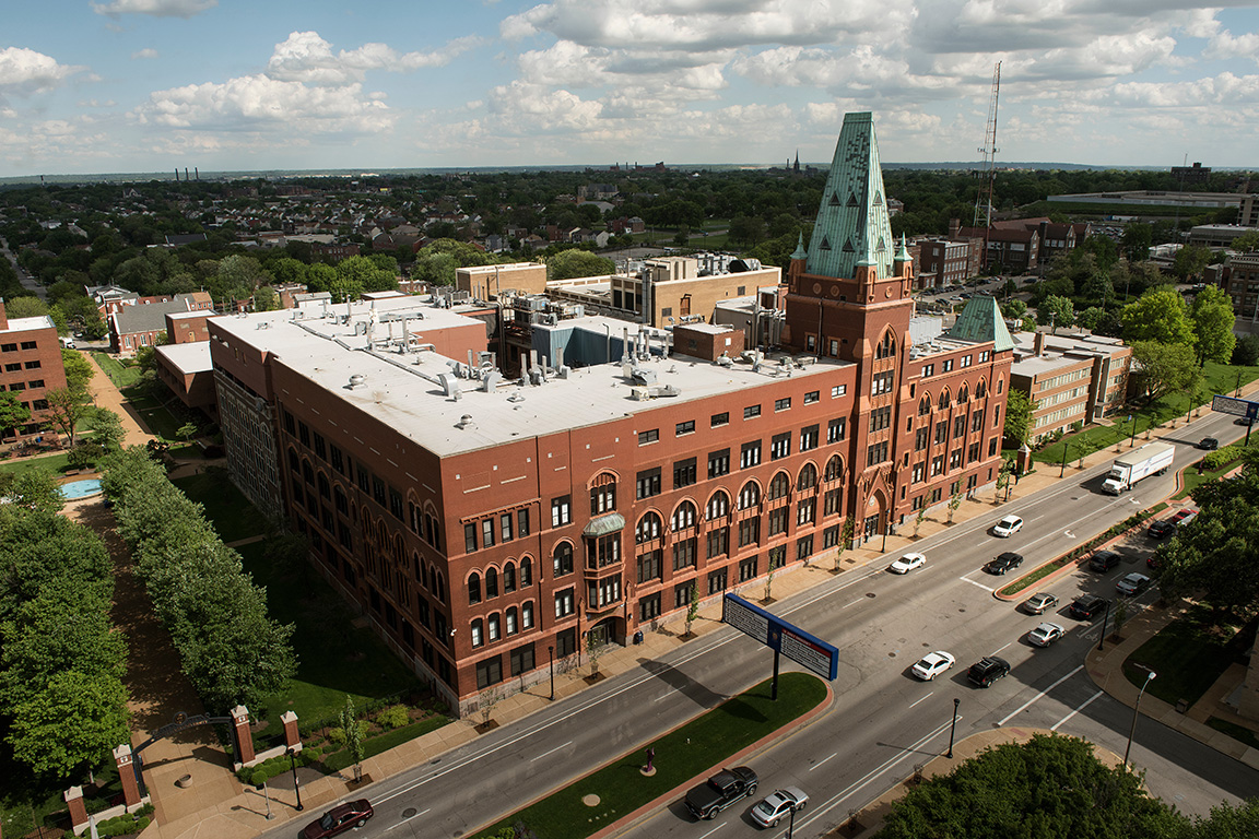 An exterior bird's eye view of a building on a sunny day.