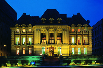 A photo of a building at night. 