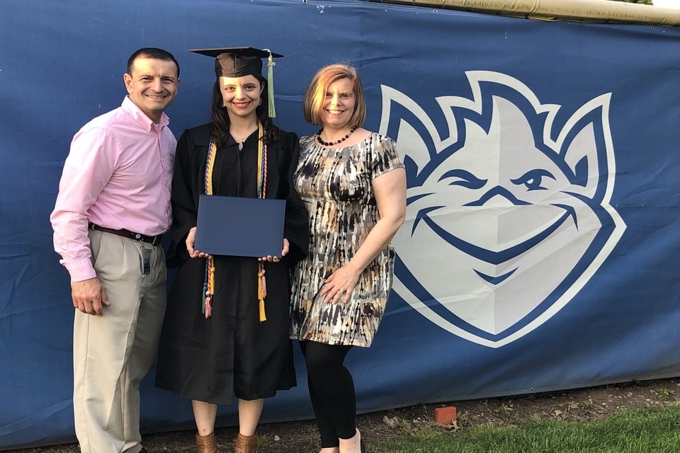 Frank Tucci and his family, including his daughter, celebrating her SLU graduation.