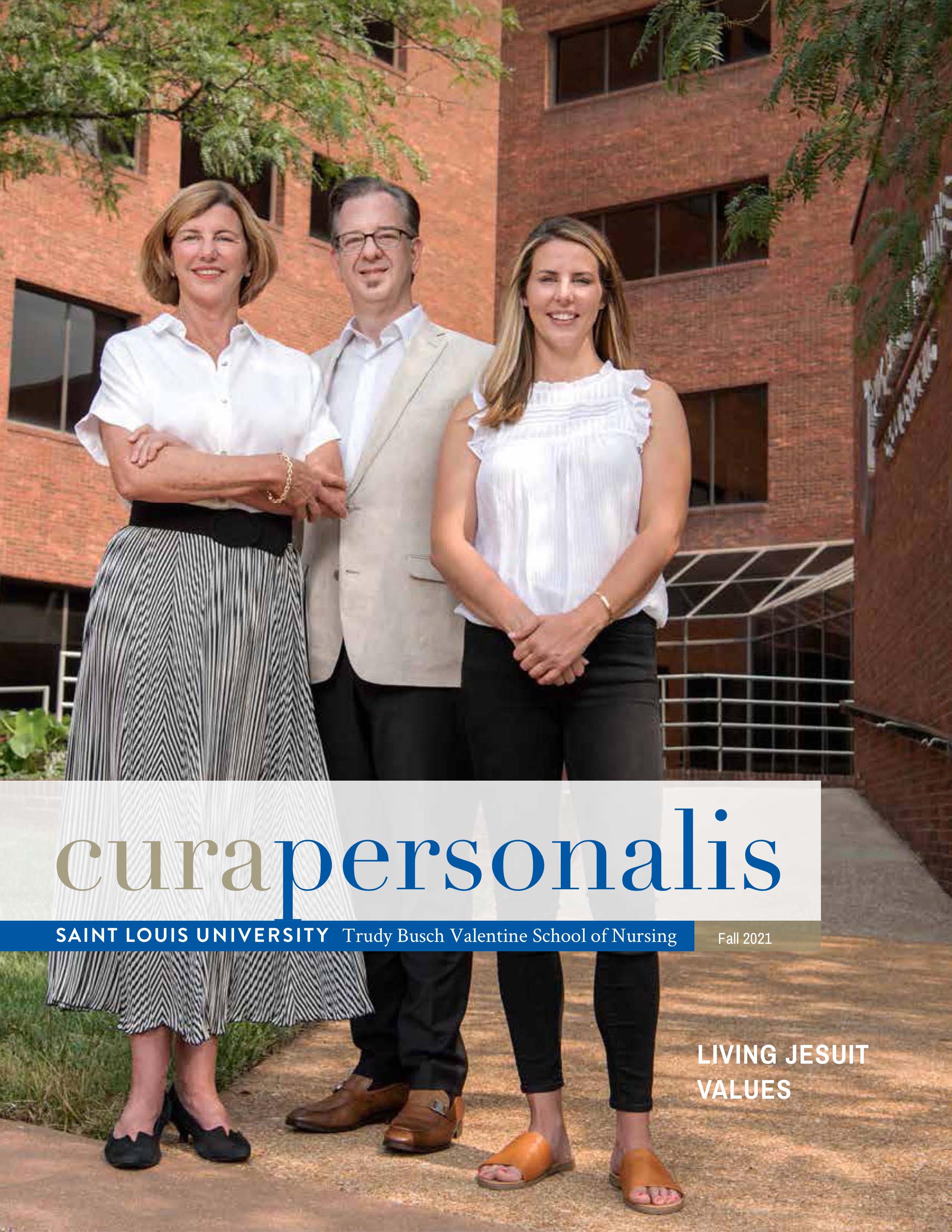 The 2018 cover of cura personlis showing a three people posed outside the nursing school