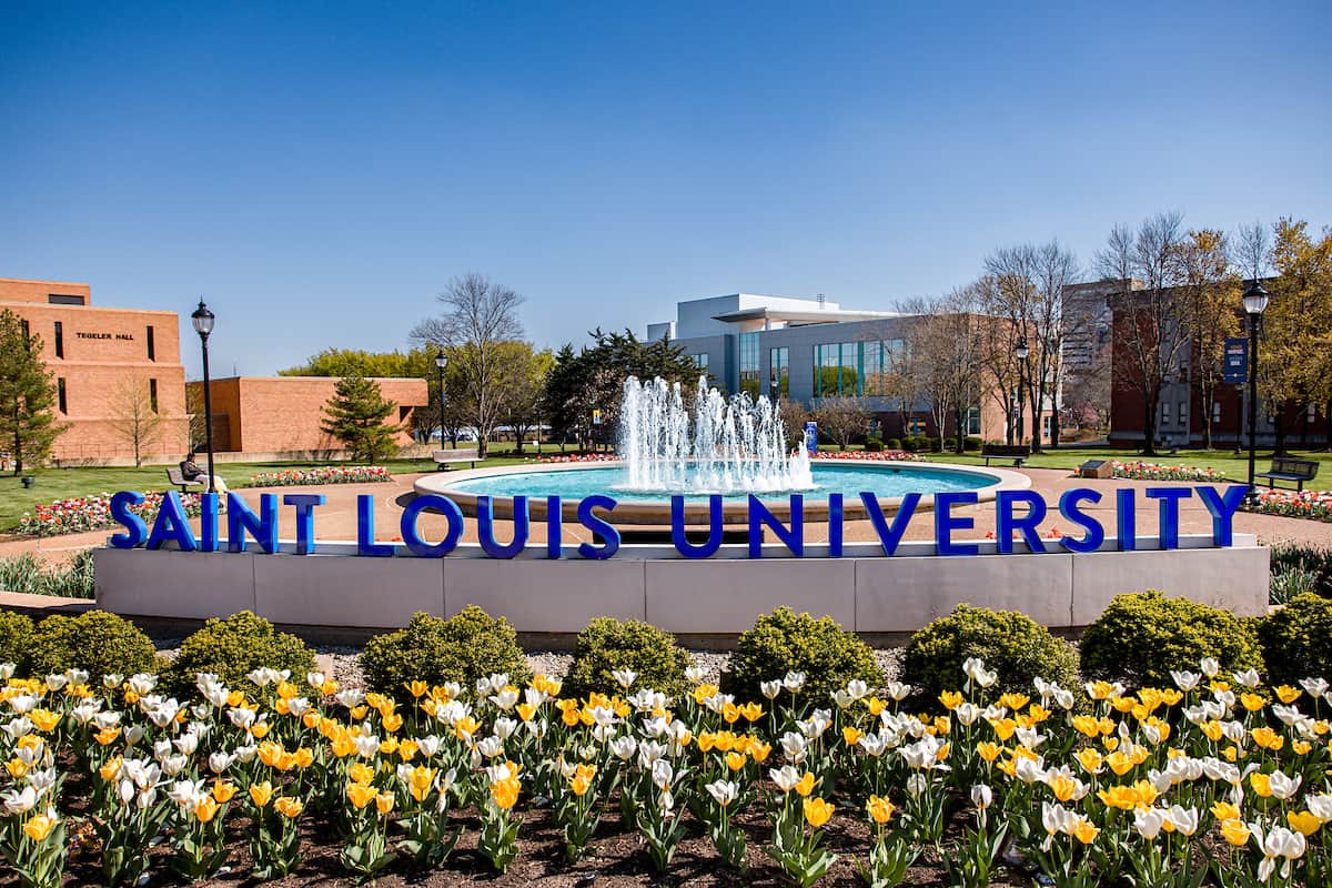 SLU outside spring with blue letters