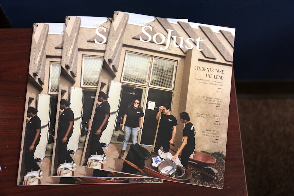 The cover image of the magazine features participants in public health service day volunteering at the Denver Indian Center.