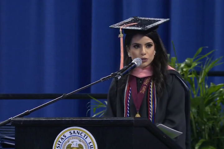 Nida Al-Ramahi addresses students in her precommencement speech.