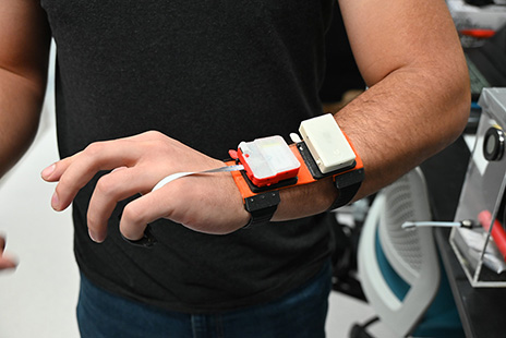 Nicolas Prudencio demonstrates the touch-based technology being developed by the CHROME Lab at SLU.