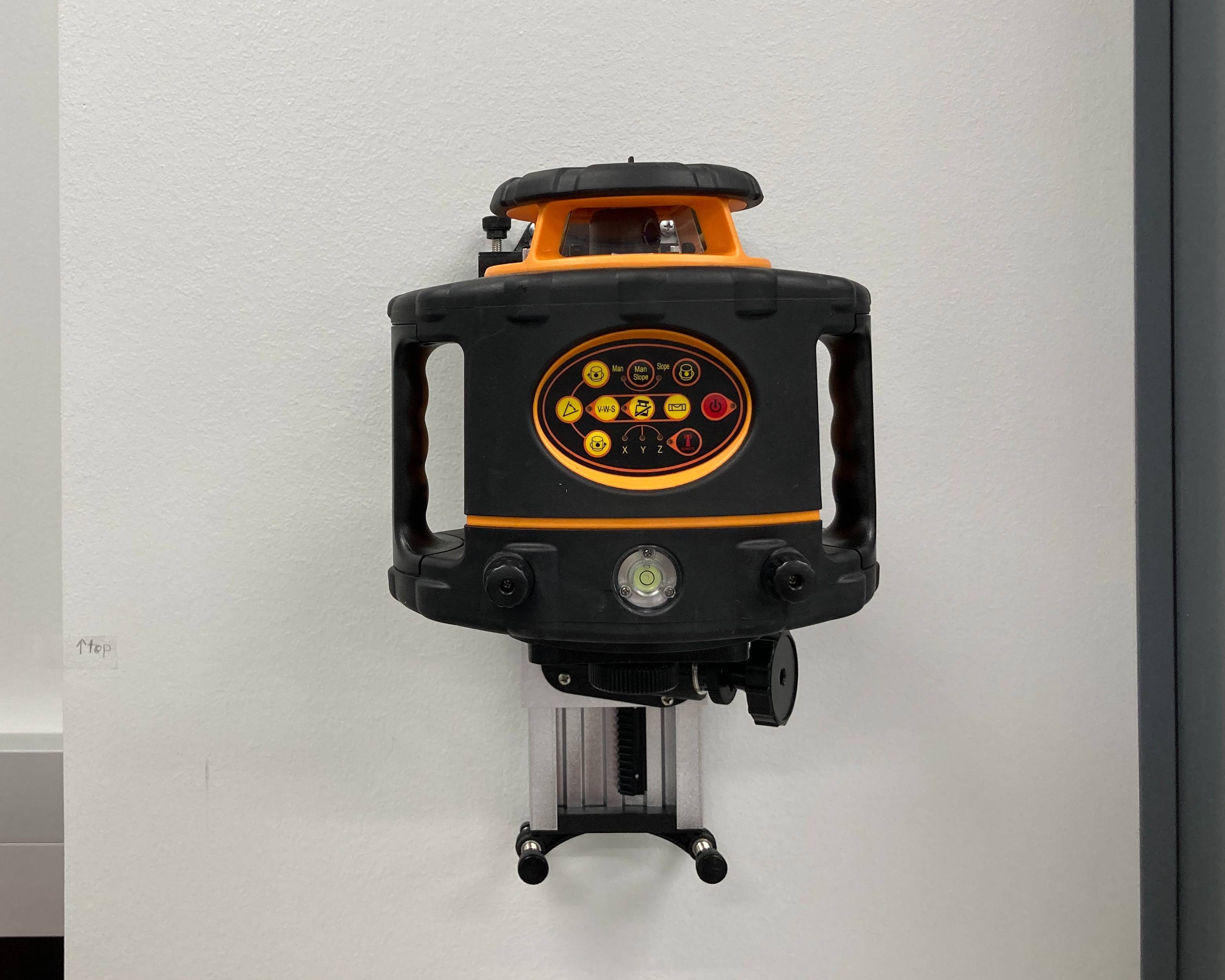 Rotary Laser Level Mounted to Wall in WATER Lab