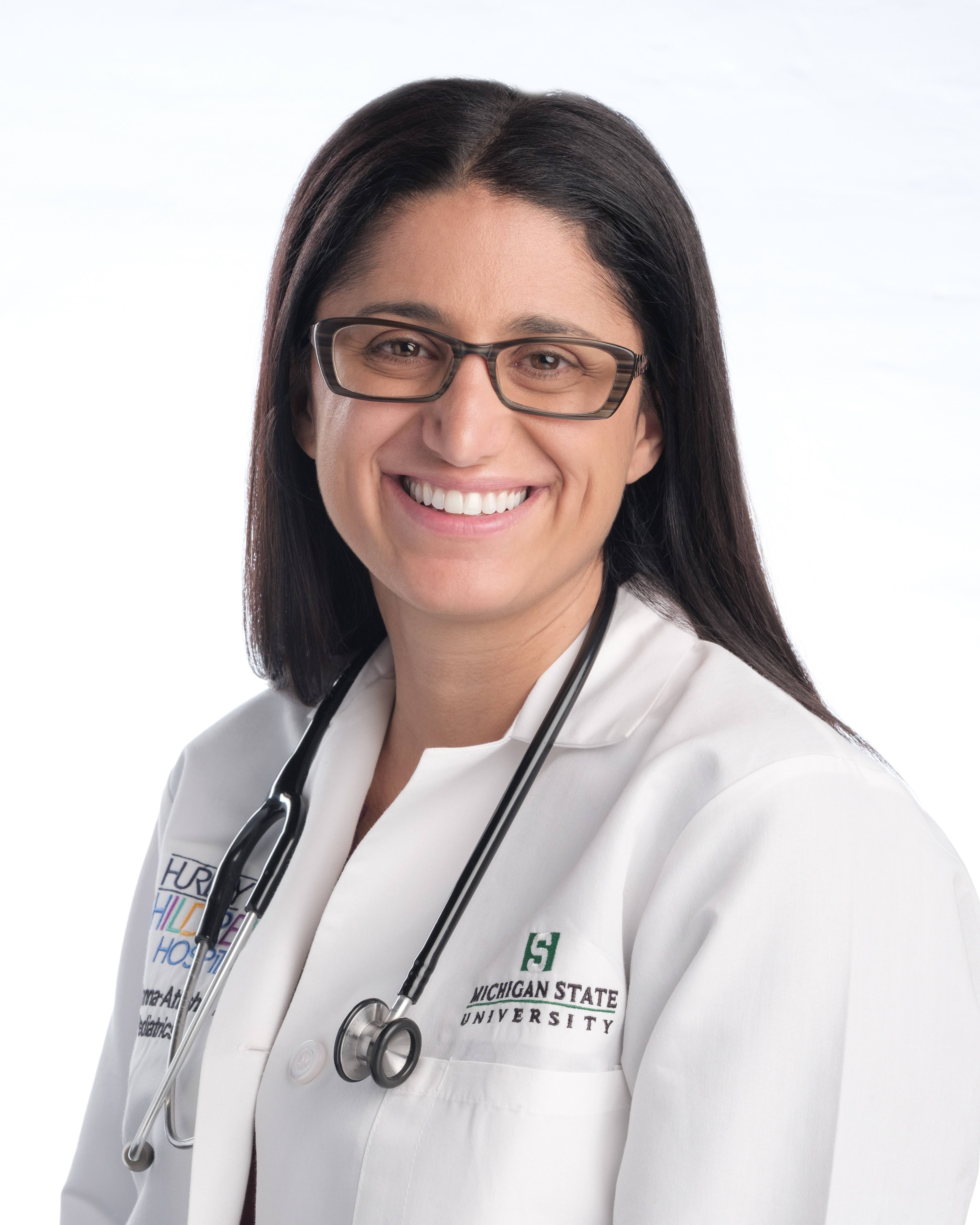 Dr. Mona Hanna-Attisha Headshot in Physician Coat