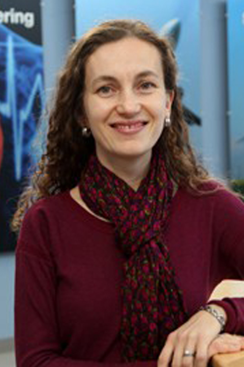 Photo of Professor Silviya Zustiak with medical background image