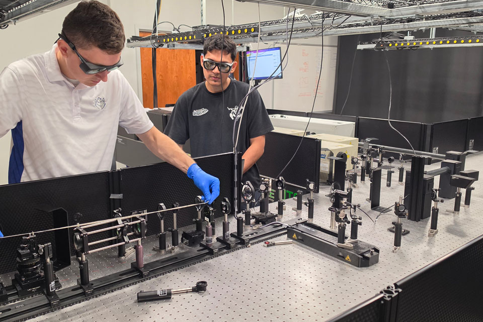 KLab Photonics Lab Two students work in the Ultrafast Laser Lab