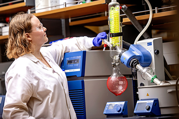 Chemistry research A student works with chemistry equipment in a lab