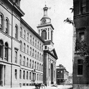 The original St. Francis Xavier College Church as it stood in the 1870s at its original location at the corner of Ninth Street and Lucas Avenue.