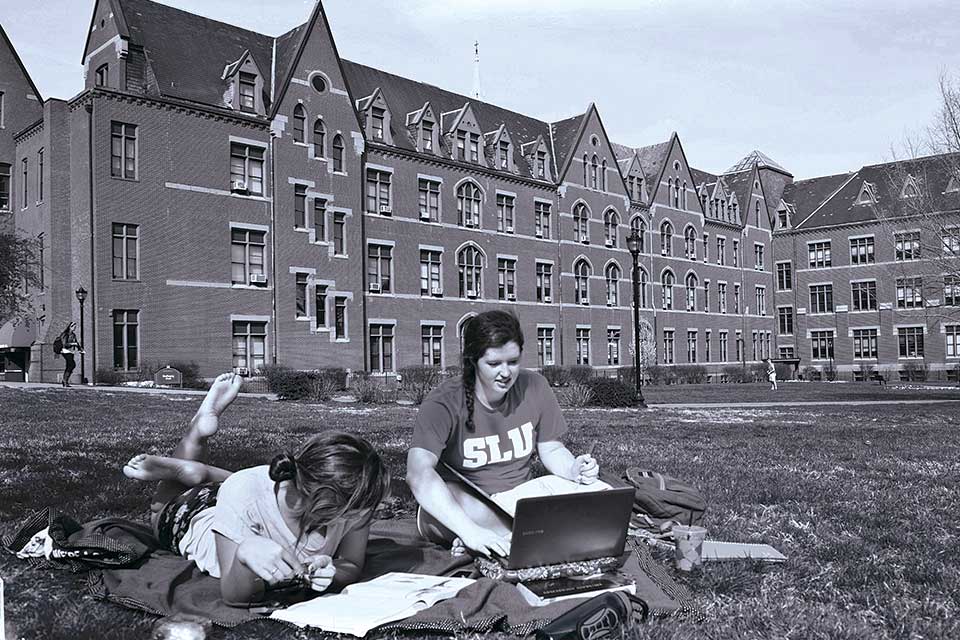 Students studying on the quad