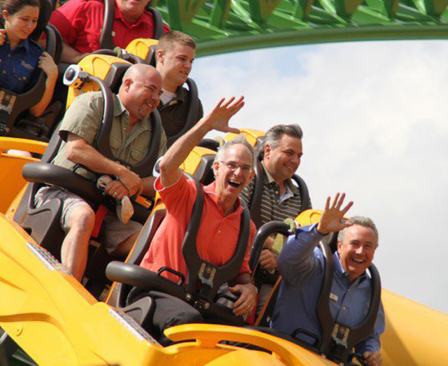 Jim Dean riding a roller coaster