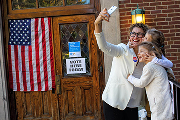 Cutraro with her daughters on election day 2016