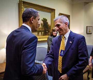 Garza shaking hands with Barack Obama