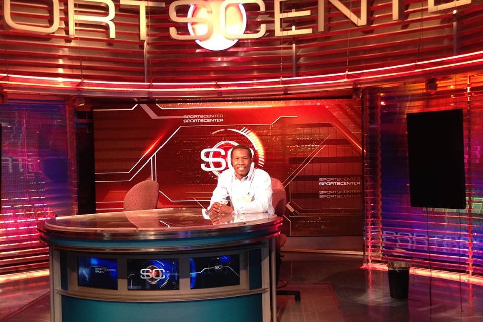 SLU alumnus Bryan Beasley (CSB '11) sits behind the SportsCenter desk at ESPN