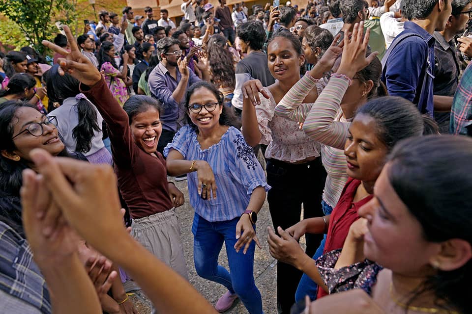 Students dance together at the SLU International Student Ice Cream Social