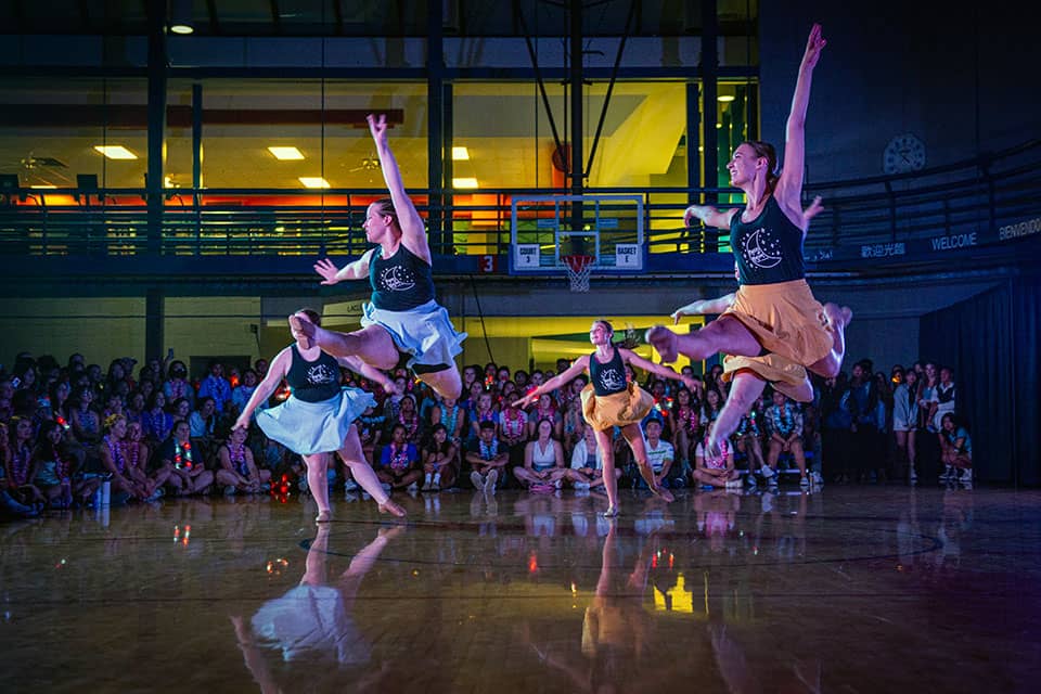 Performers dance during a Fall Welcome event in the Rec.