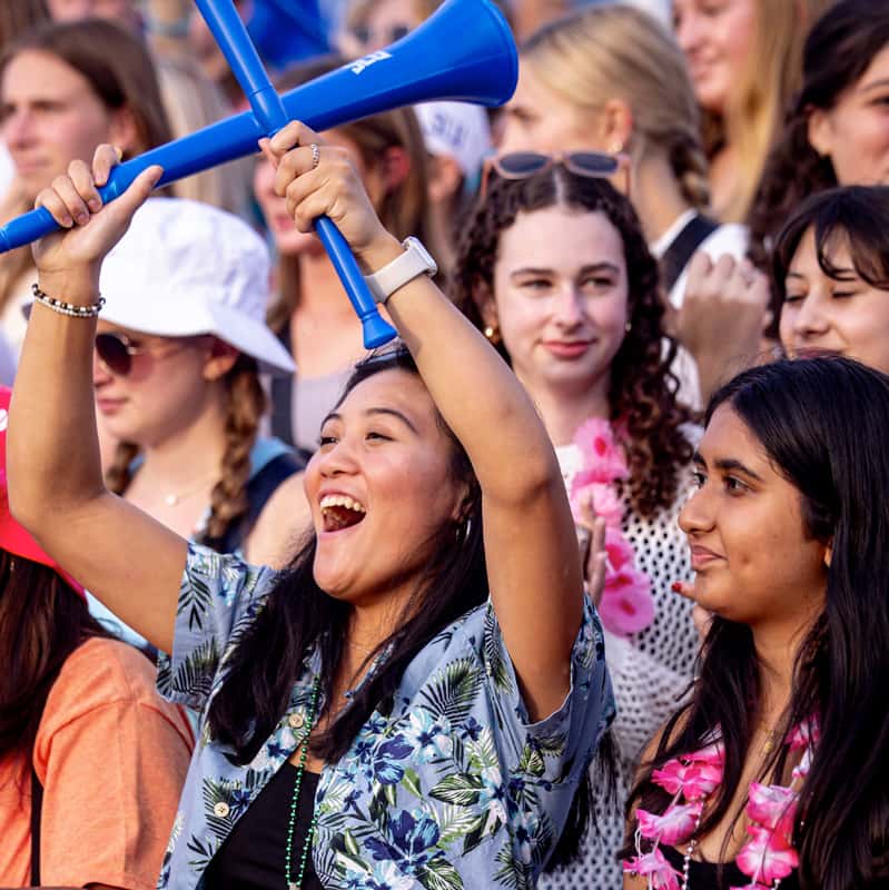 The crowd of students cheering at a Billikens soccer game